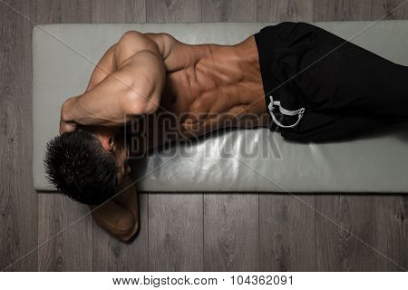 Healthy Man Doing Abdominal Excerise On Foor