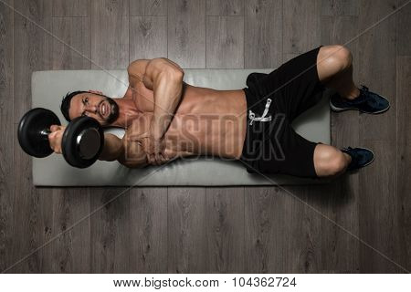 Healthy Man Doing Triceps Excerise On Foor