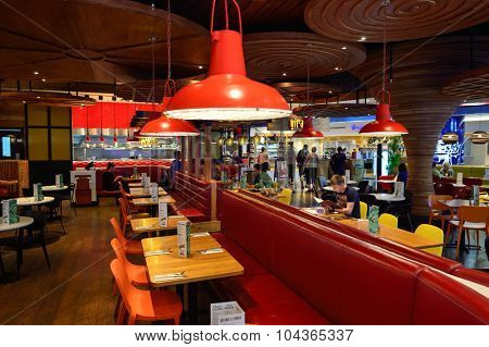 DUBAI, UAE - SEPTEMBER 08, 2015: restaurant in Dubai Airport. There are a lot of restaurants, bars, cafes and shops in Dubai International Airport. Almost all of them are open twenty-four hours.