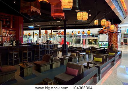 DUBAI, UAE - SEPTEMBER 08, 2015: restaurant in Dubai Airport. There are a lot of restaurants, bars, cafes and shops in Dubai International Airport. Almost all of them are open twenty-four hours.
