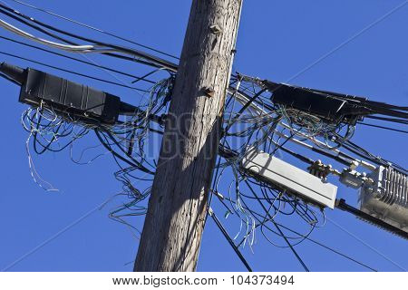 Telephone Terminals in Disarray on Phone Pole