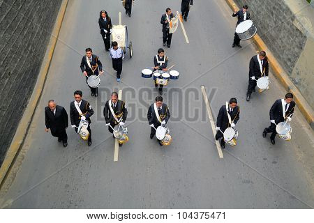 La Paz, Bolivia - 23 March 2013: Musicians march in military parade for dia del mar in La Paz capitol Bolivia. Die del Mar is celebrated annualy on the day Bolivia lost the Litoral province to Chile and therefore sea access in the war of the pacific. It's