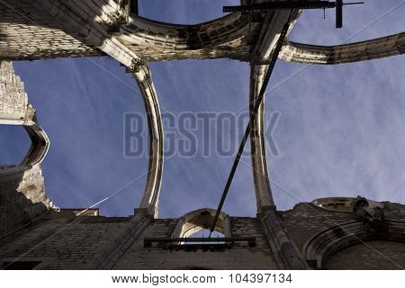 Looking Up At The Roofless Carmo Convent In Lisbon
