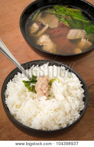 Pork soup made from pork bone with Ma-Li rice.break fast or diner Thai food