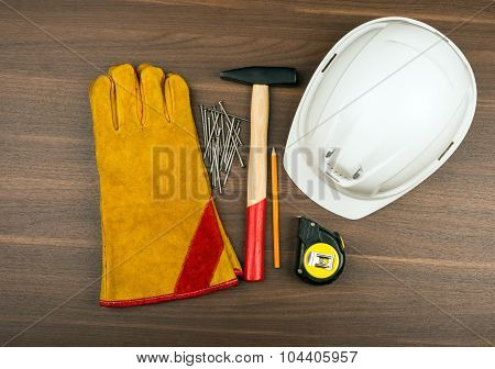 Construction gloves with helmet