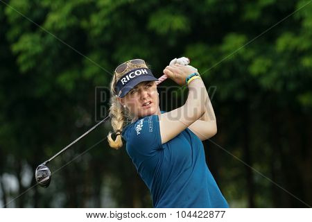 KUALA LUMPUR, MALAYSIA - OCTOBER 10, 2015: England's Charley Hull tees off at the sixth hole of the KL Golf & Country Club on Round 3 day at the 2015 Sime Darby LPGA Malaysia golf tournament.