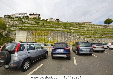 Cars From Various Countries At The Parking