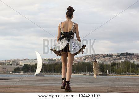 Models Walk An During  Outdoor Fashion Show With Clothing Made Out Of Recycled Materials Was Held In