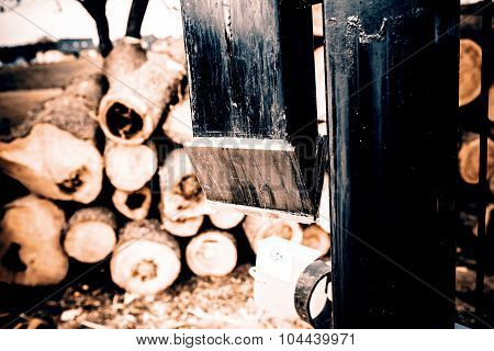 wood splitter in action, wood for fire in winter