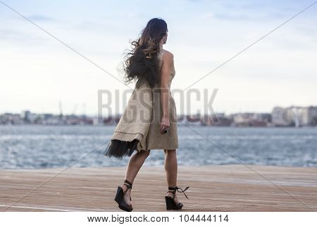 Models Walk An During  Outdoor Fashion Show With Clothing Made Out Of Recycled Materials Was Held In
