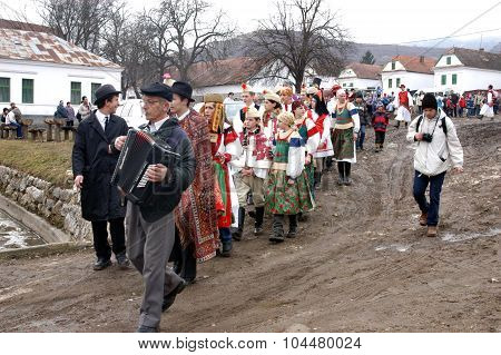 People In Traditional Costumes Celebrating The Winter Carnival