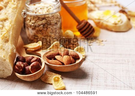 Healthy breakfast with bread, honey, nuts. Country breakfast concept