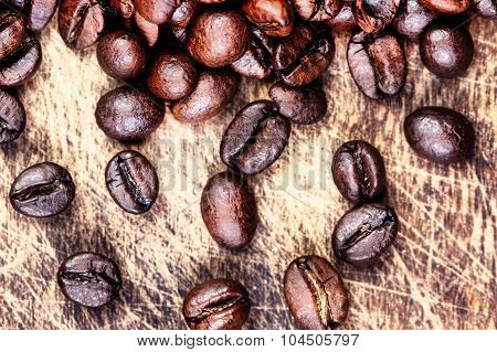 Top View Of Coffee Beans On Dark Vintage Background