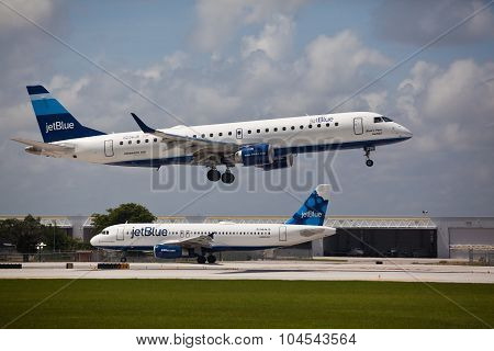 FORT LAUDERDALE, USA - May 24, 2015: A Jetblue Airlines Embraer 190 aircraft landing.