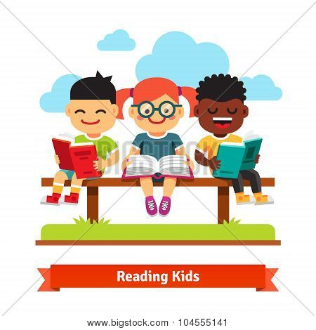 Three kids sitting on the bench and reading books