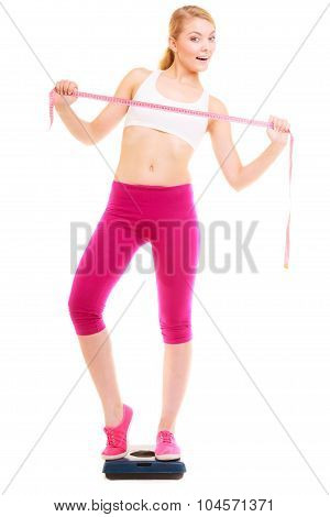 Happy Woman On Weighing Scale. Diet Weight Loss.