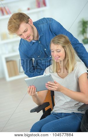 Couple using a tablet computer