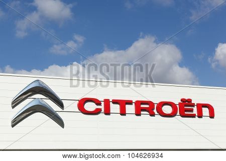 Citroen logo on a facade of a dealer
