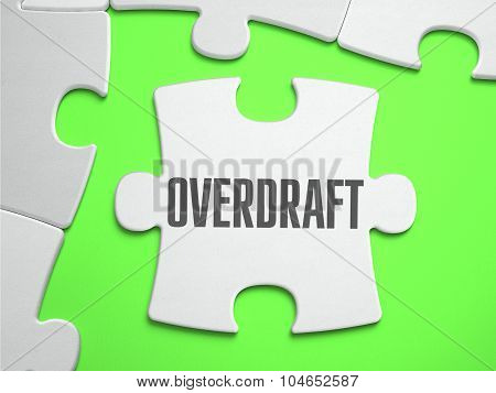Overdraft - Jigsaw Puzzle with Missing Pieces.