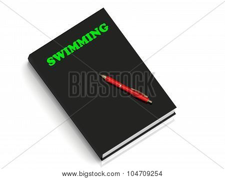 Swimming- Inscription Of Green Letters On Black Book