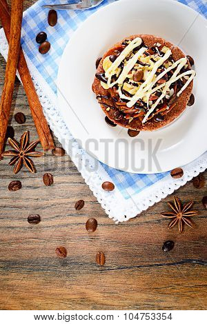 Chocolate Nut Cake on Vintage Retro Woody Background