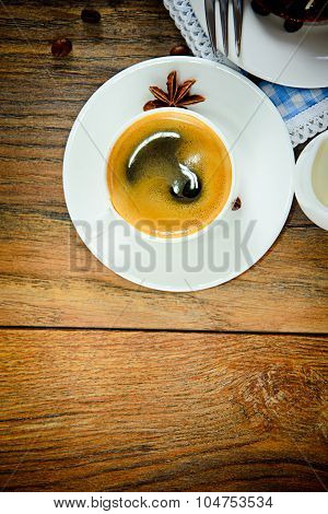 Cup of Coffee on Woody Background in Retro Vintage Style