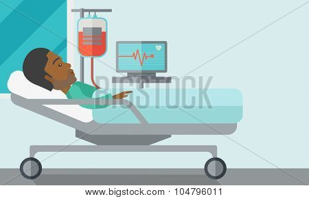 An African American patient lying in hospital bed with heart rate monitor and drop counter isolated on white background. Horizontal layout with a text space for a social media post.