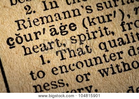 Close-up Of The Word Courage And Its Definition