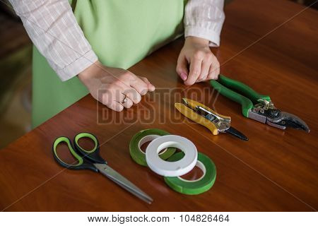 Florist Tool In The Hands Of A Woman Making A Bouquet