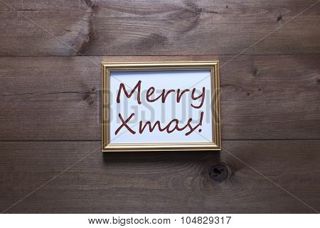 Golden Picture Frame With Copy Space And Text Merry Xmas