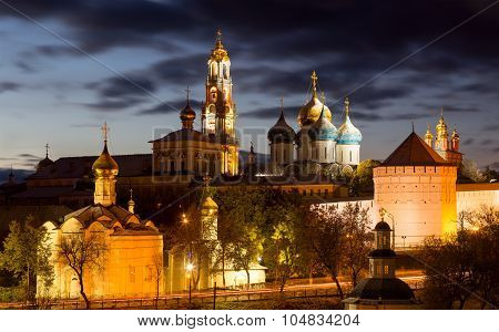 Panorama Of The Trinity Lavra Of St. Sergius After Sunset With A Spectacular Backlight