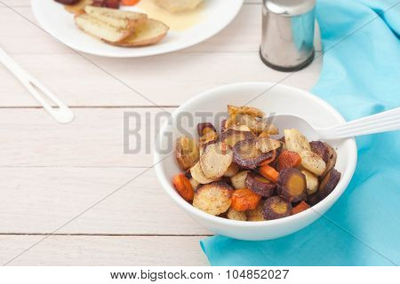 roasted root vegetables: carrots, parsnips, sliced and roasted with honey and cinamon