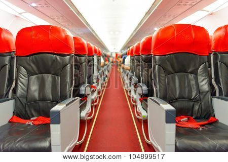 KUALA LUMPUR, MALAYSIA - MAY 02, 2014: AirAsia Airbus A320-200 interior. AirAsia Berhad is a Malaysian low-cost airline headquartered near Kuala Lumpur, Malaysia