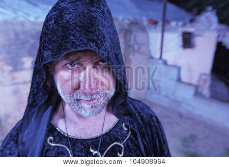 Serious Witch In Cloak