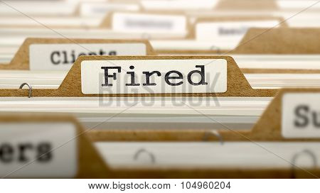 Fired Concept with Word on Folder.