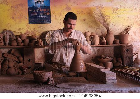 Ceramics. Manual production. A man at work.