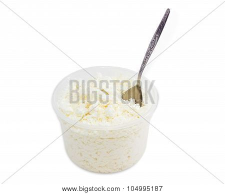 Container Of Cottage Cheese With Tea Spoon