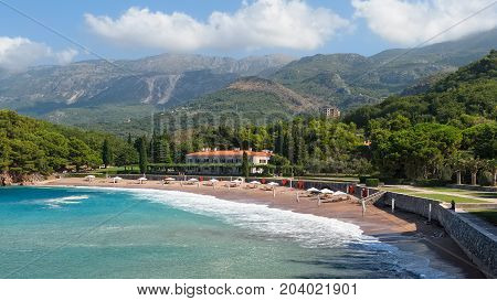 MONTENEGRO, PRZNO - AUGUST 12, 2017: View of the beaches and four-star hotel Kraljicina Plaza near the island of Sveti Stefan
