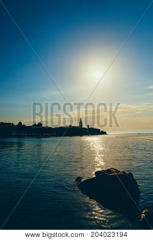 Sunset On The Seashore. City View Walk Along The Seafront