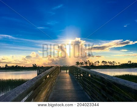 Reflection Of A Sunset Over The Everglades After A Storm