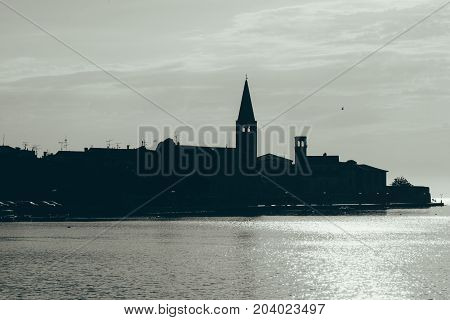 Sunset On The Seashore. City View Walk Along The Seafront