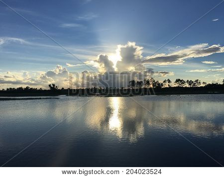 Reflection Of A Sunset Over The Everglades After A Storm