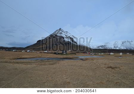 Arnastapi village and mount Stapafell in Iceland.