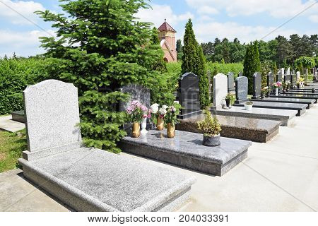 Tombstones in the Public cemtery in summer