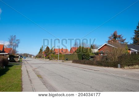 Road trough a Danish Village on a sunny day