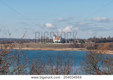 KAlvehave church near the Danish coast on a spring day