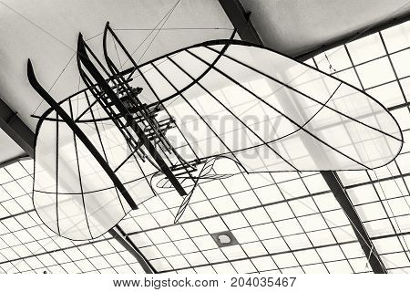Historic airplane national technical museum in Prague Czech Republic. The transportation history exhibit. Black and white photo.