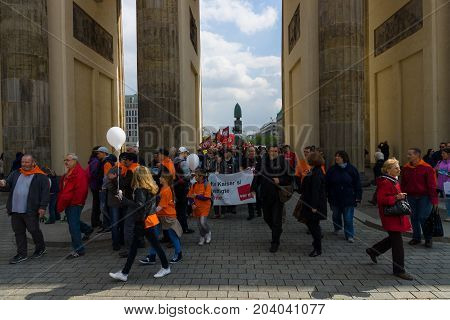 BERLIN - MAY 01 2015: International Labour Day. Demonstrators near the Brandenburg Gate.