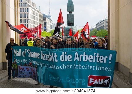 BERLIN - MAY 01 2015: International Labor Day. Demonstrators near the Brandenburg Gate.