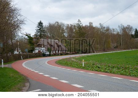 Road And House In Praesto Fjord In Denmark